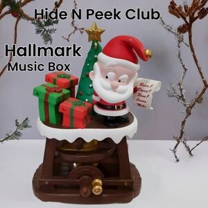 Hallmark Christmas Ormament Hide N Peek Music Box Santa Ornament